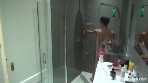 Very sexy stepmom gets recorded while showering