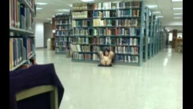Asian teen flashes in public library